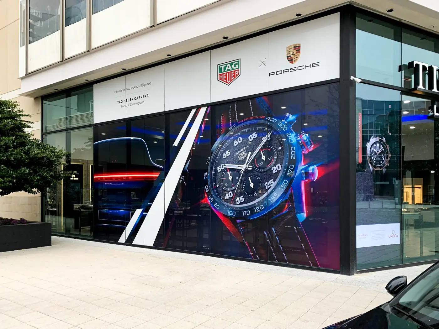 Premium storefront window graphics featuring a luxury watch display
